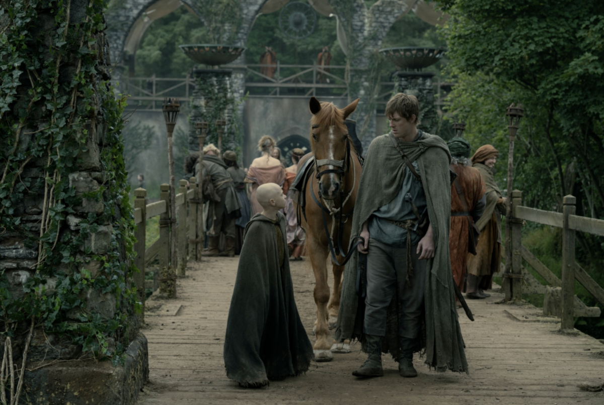 From the left, Egg (Dexter Sol Ansell) and Ser Duncan the Tall (Peter Claffey), walking around at the knights' tournament at Ashford in "A Knight of the Seven Kingdoms."