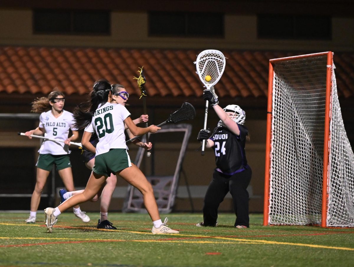 In the final quarter of the game, the Sequoia High School goalie blocks a close-range shot by Viking junior Zoe Quintana. According to Viking senior team captain Sophia Singer, the Vikings ran plays and played well on defense. "We've been working on some plays that we implemented today," Singer said. "Our defense has been struggling a little bit, but today, I think we did a really great job."