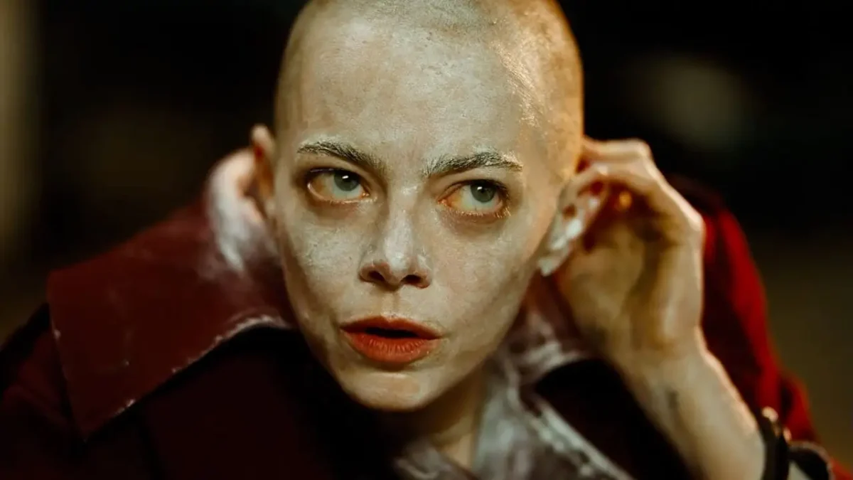 Michelle Fuller (Emma Stone) wakes up to her hair shaved and face covered in cream after being kidnapped in "Bugonia" by Teddy (Jesse Plemons) and Don (Aidan Delbis) The film is nominated for four Oscars, including Best Picture and Best Actress for Stone.