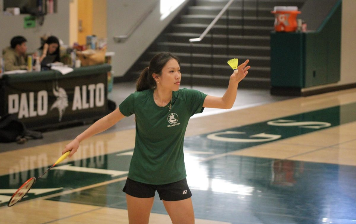Viking senior Nicole Krawczyk gears up for a serve in a tournament March 17 at Palo Alto High School. According to Paly badminton coach Gabriel Fossati-Bellani, Krawczyk is a big asset to the team. “Whenever she plays, she wins,” Fossati-Bellani said. “She is a strong player, and I think any other team would love to have her on the team.”