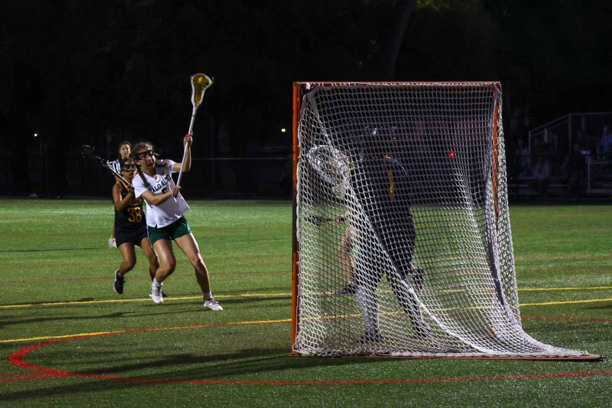 Vikings freshman Hanna Karsner flings a ball to score against Wilcox Chargers last Wednesday at home. “It's important that we play cohesively... more organized and have some more plays and a lot more dynamism," Chiu said. "On defense, we just need to be more communicative and work on defensive footwork," Chiu said.