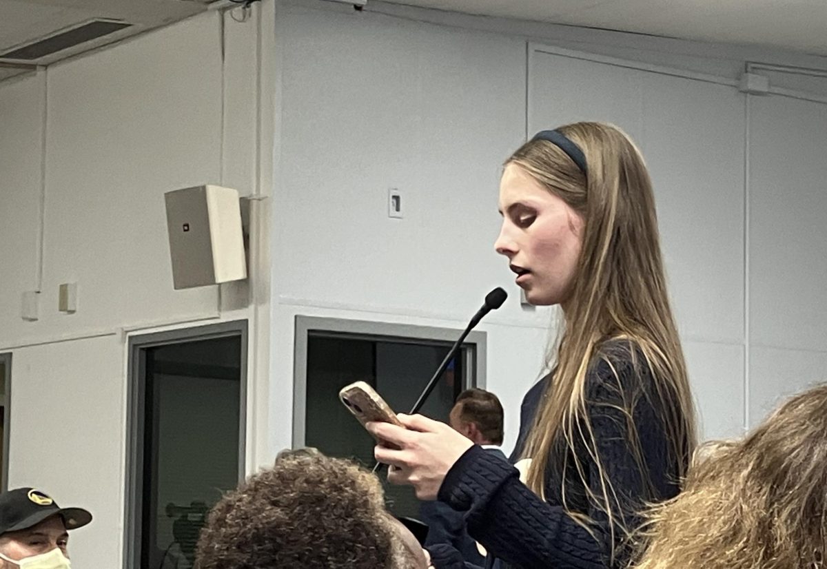 Junior Julia Curtis speaks to a full room about why she thinks the Churchill crossing should be closed at 6 p.m. on Thursday. According to Curtis, her social media posts about the proposed closure and mental health resources have drawn widespread attention from students and community members. “I’ve gotten so much response to my social media posts and stories about the petition and about the closure and mental health resources,” Curtis said.