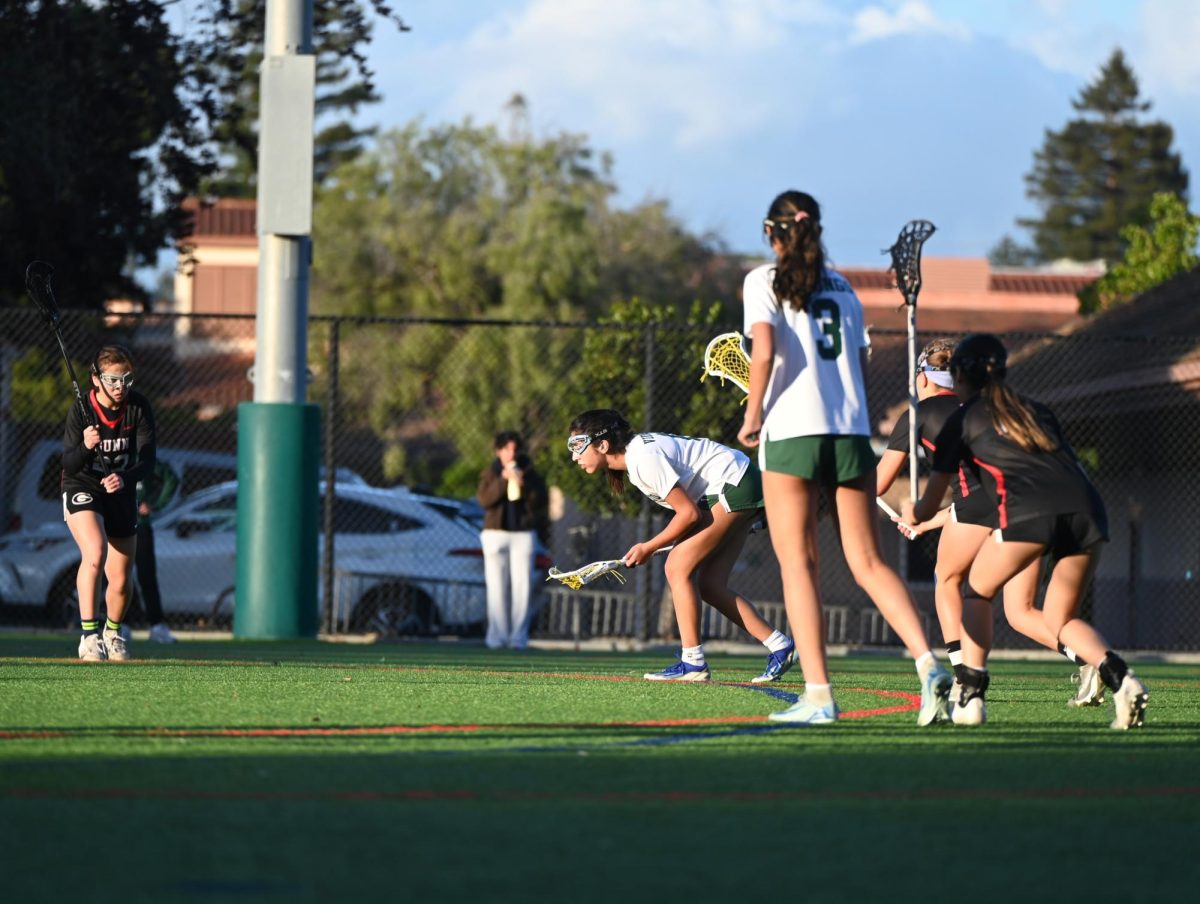 Viking sophomore Zara Mathoda prepares to shoot a penalty shot in the first quarter against the Gunn High School Titans on Wednesday night at home. According to Viking freshman Hannah Karsner, support from the Viking head coach Kaitlin Chiu helped them get the win. "I think our coach really helped us push through, and she gave us a lot of motivation before, which really helped," Karsner said.