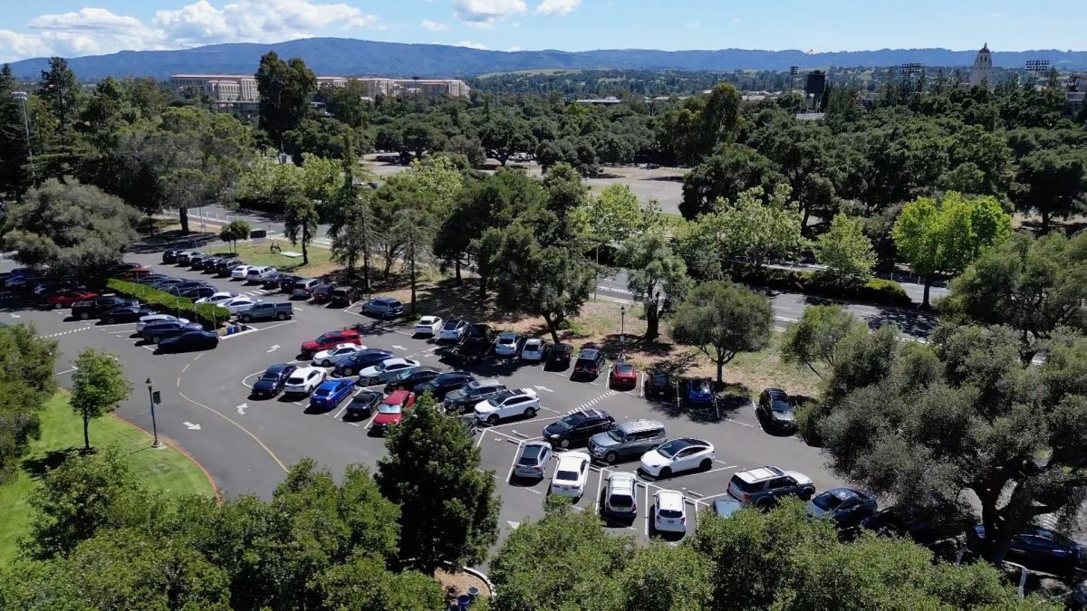 A bird’s-eye view of Palo Alto High School’s parking lot shows filled spaces during the school day as students navigate limited availability. Paly junior Alexander Lawson said he aims to reach school earlier to find a parking spot. “I try to get to school pretty early, which helps me find a spot," Lawson said. "But there have been times where I have to leave school … and then I come back and all the parking spots are taken and it's really hard to find a spot."