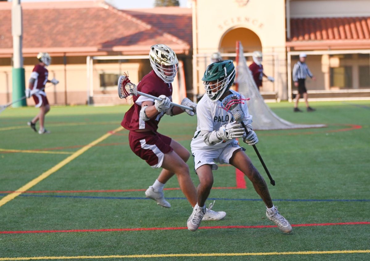 Viking senior Shalin Dwivedi prepares to run around a Chieftain defender Tuesday night at Palo Alto High School. According to Dwivedi, the Vikings played well on offense. "When we got the ball on offense, we did a really good job of taking our time and not rushing it so we can give the defense a break," Dwivedi said.