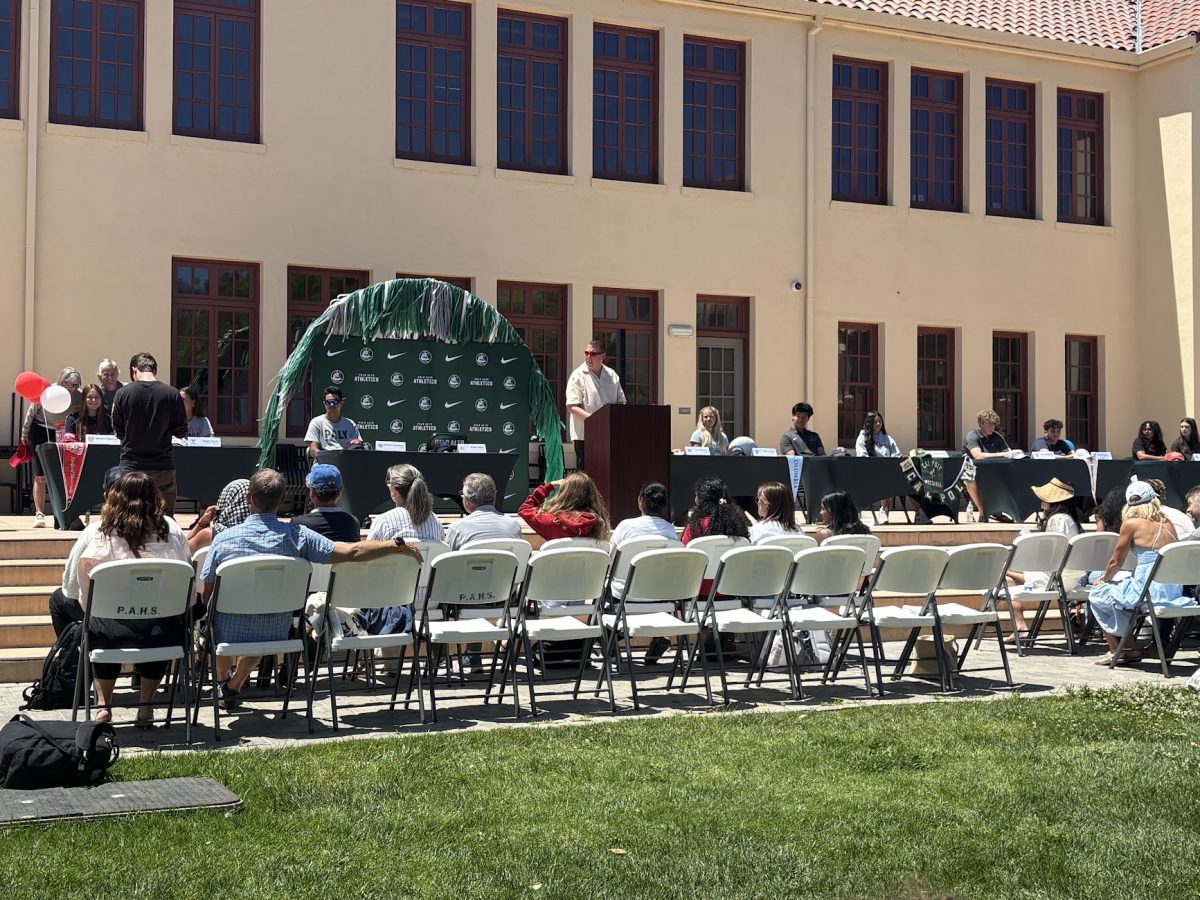 Student athletes gather on the steps of for Signing Day as they celebrate their commitment to collegiate-level sports at lunch Tuesday on the steps of the Tower Building at Palo Alto High School. According to senior Fallon Porter, who is committed to Occidental College for swim and water polo, she is looking forward to a new chapter in her journey. "I’m really excited to play with another team,” Porter said. “I’m kind of nervous, but I’m really excited.”
