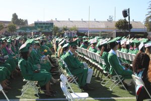 Students await receiving their diploma during Palo Alto High School's Class of 2026 graduation this afternoon at the Viking Stadium. According to PAUSD Board of Education President Shounak Dharap, failing is a step before success. "You will find that if you can fail over and over and over again, then when the time comes to do the new thing ... and when everyone around you is frozen and paralyzed by the fear of what could go wrong, you won't be," Dharap said.