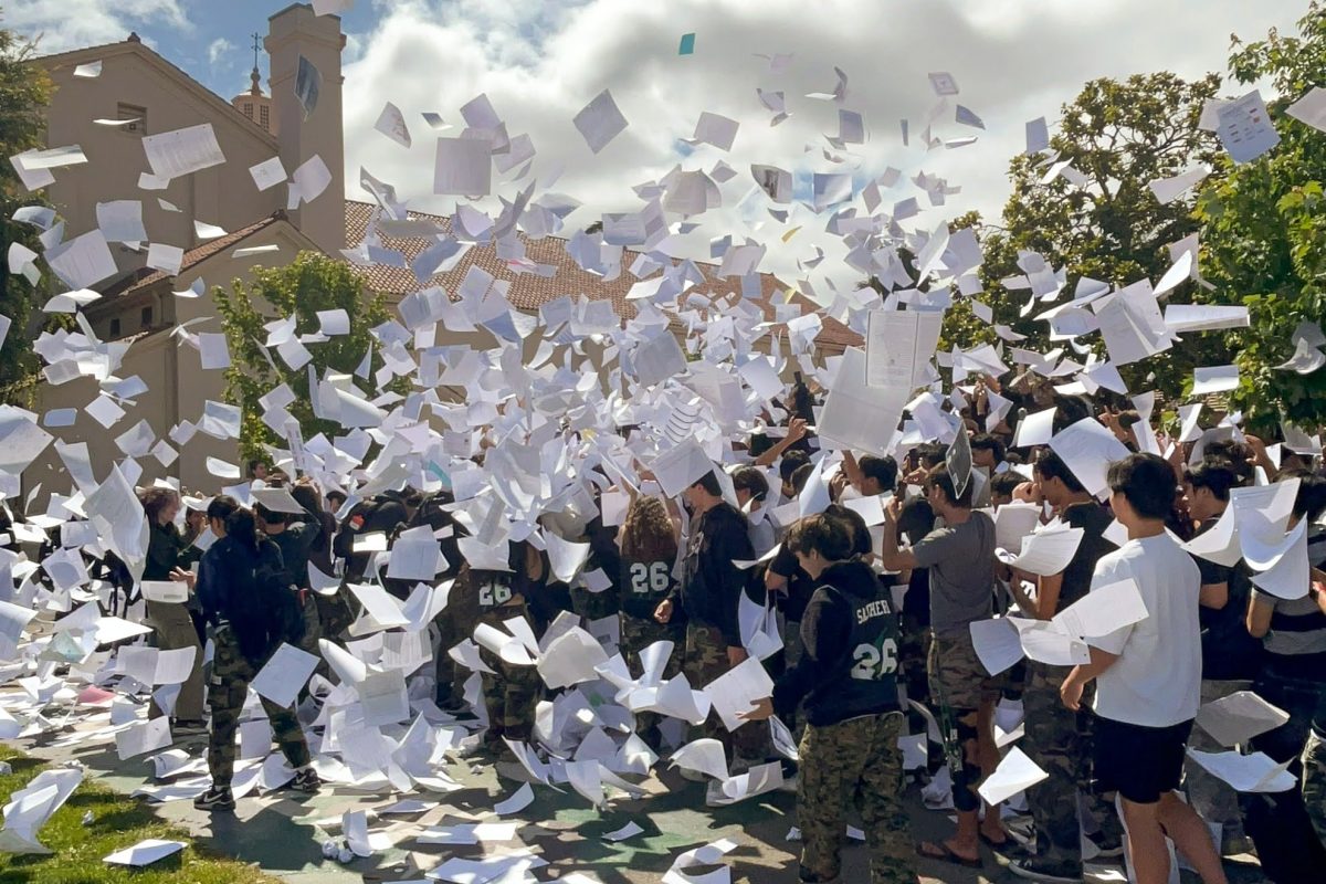 Palo Alto High School seniors toss their papers into the air during Friday’s senior celebration on the Quad. According to senior Aryav Singh, the final tradition of tossing graduation papers marked both a sense of relief and the emotional close of his high school experience. “Throwing the papers felt like a weight off of my shoulders, but it was also sad because it kind of felt like the end of a lot of memories that I'm going to miss," Singh said.