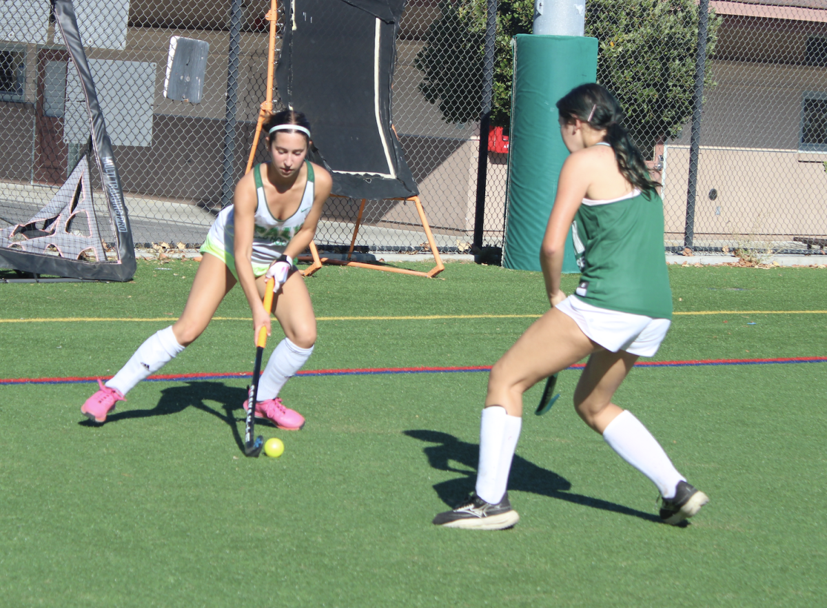 Junior forward Ela Aba dribbles past a defender Wednesday at practice. According to Aba, she is enthusiastic to see how the season ends. “I’m really excited to play with this team, and I’m excited to see how this season turns out," Aba said.